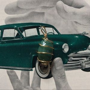 Beautiful handcrafted gold caged crystal